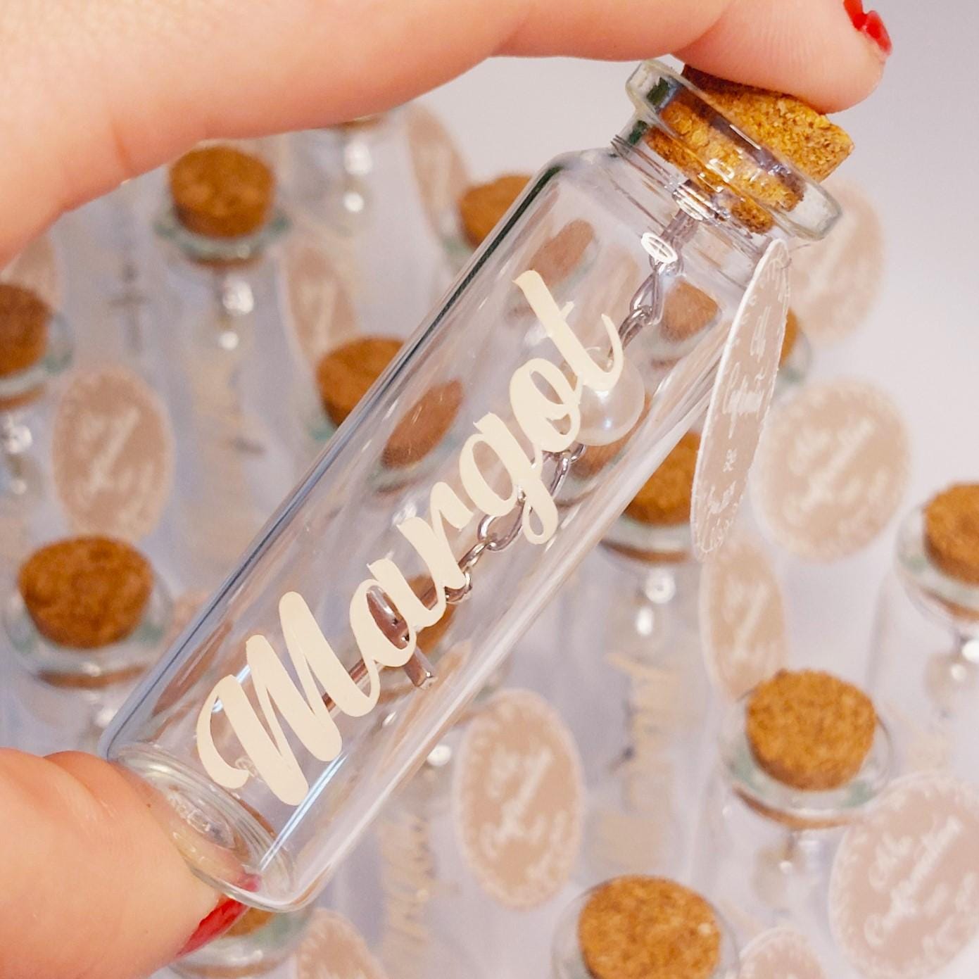Botella pequeña personalizada con cruz